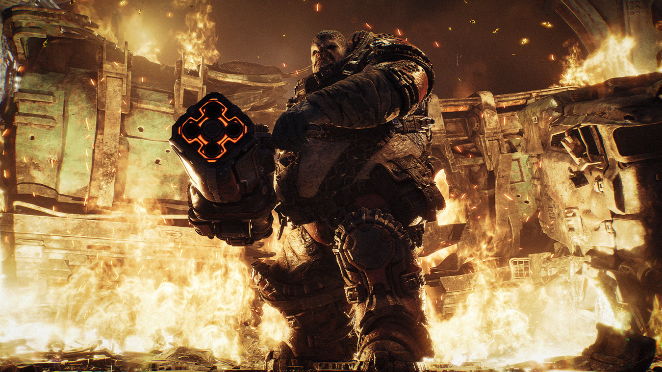 Official Gears of War: E-Day screenshot of a Locust soldier with a flamethrower surrounded by fire